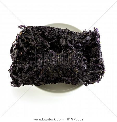 Dried Black Seaweed Close Up Isolated On White Background