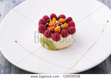 Sweet dessert on plate with berries and kiwi fruit
** Note: Soft Focus at 100%, best at smaller sizes