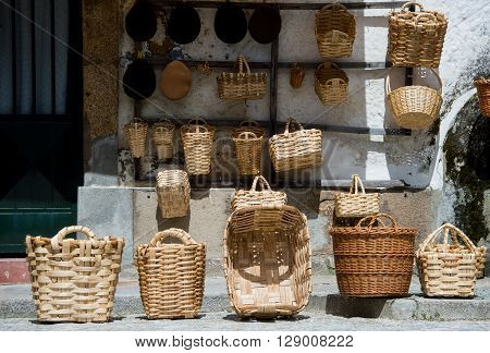 Baskets of wicker workshop in street, Porto, Portugal
