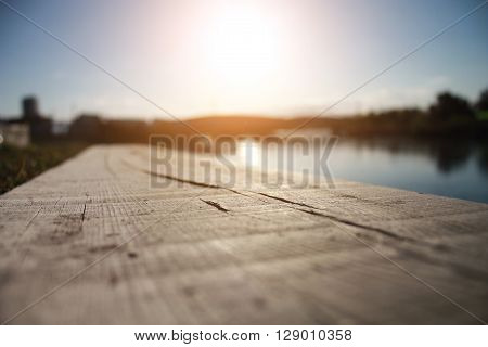 Beautiful Hazy Views Of The Sun River With The Bridge In Focus Tree