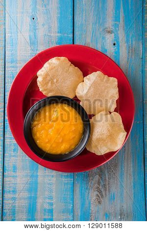 Aamras or Aam Ras Puri: Puri which is an indian fried small bread and alphonso mango pulp is a popular lunch especially during Padwa, the Marathi new year, maharashtrian lunch/dinner menu