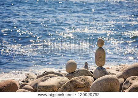 Stone stacks on Boulder Beach, Acadia National Park, Maine, USA. Space for your text.