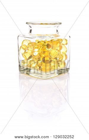 Fish Oil Capsules In Translucent Bottle On White Background