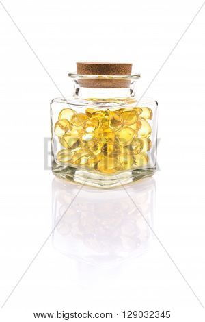 Fish Oil Capsules In Translucent Bottle On White Background
