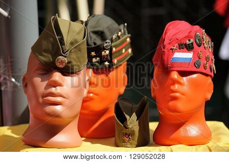 Orel Russia - May 9 2016: Celebration of 71th anniversary of the Victory Day (WWII). Dummy heads in soviet field caps closeup