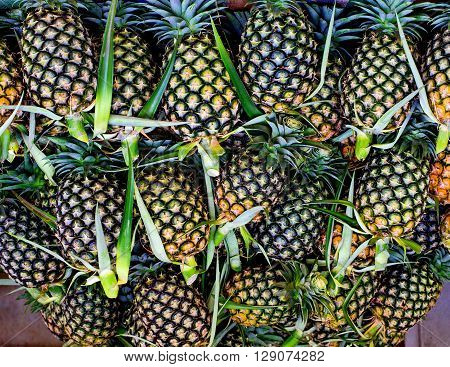 Maui gold pineapples on display at the farmer's market in Thailand