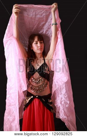 portrait of belly dancer on black background