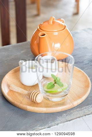 Hot pot of honey lime healthy drink, stock photo