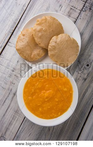 Aamras or Aam Ras Puri: Puri which is an indian fried small bread and alphonso mango pulp is a popular lunch especially during Padwa, the Marathi new year, maharashtrian lunch/dinner menu