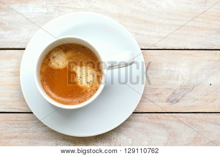 Espresso In The Cup On The Wooden Background