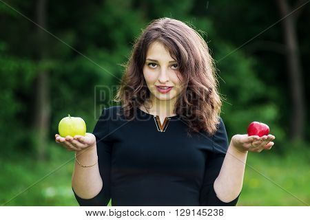 Beautiful Girl Holding A Green Apple