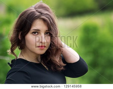 Beautiful Curly Girl In The Woods