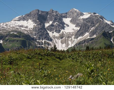 A view of Alpine mountains surrounding the village Schroecken in Bregenzerwald region Vorarlberg Austria