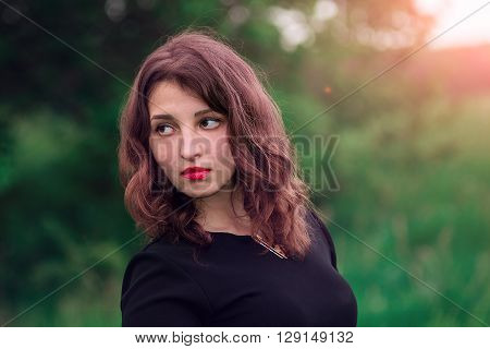 Beautiful Curly Girl In The Woods