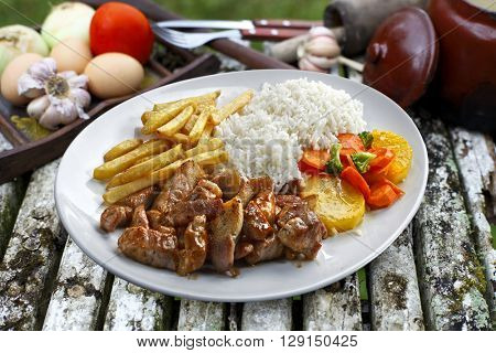 pork with rice and potatoes