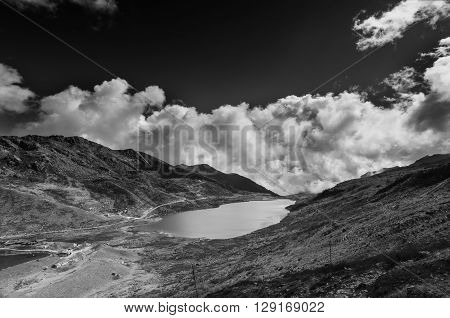 Elephant Lake named due to it's shape as a lying elephant remote high altitude lake at kupup Valley Sikkim. Himalayan mountain range Sikkim India - black and white image