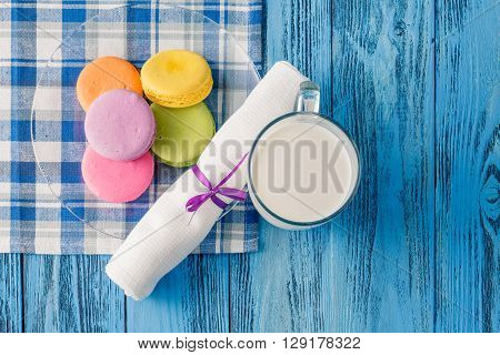 Colorful Macaroons And Glss Of Milk