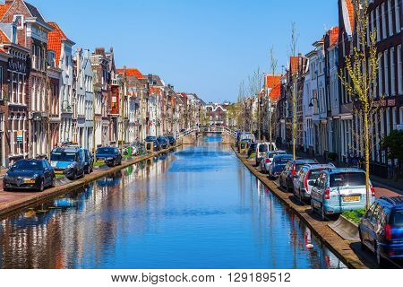 Gouda Netherlands - April 20 2016: canal in Gouda. Gouda is world famous for its cheese that becomes trade here.