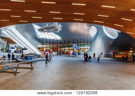 Arnhem Netherlands - April 19 2016: Arnhem Centraal railw station with unidentified people. After reconstruction it was reopened 2015. The new design was by UNStudio that won an architecture price