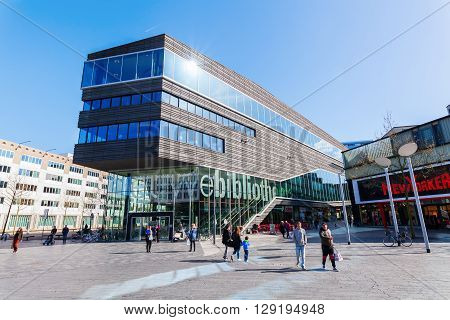 Almere Netherlands - April 19 2016: city center of Almere with unidentified people. Almere is a fast growing planned city. With a population of about 200000 it is the 7th largest Dutch city