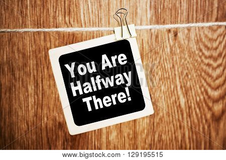 You are Halfway There. Text written on a chalkboard