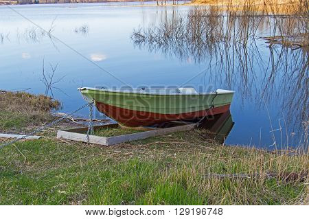 Boat is waiting for summer on the springday.