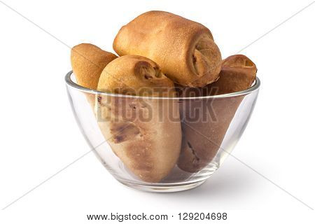 Fresh bavarian pastries rolls, kifla kiflice, in the glass bowl, isolated on white background