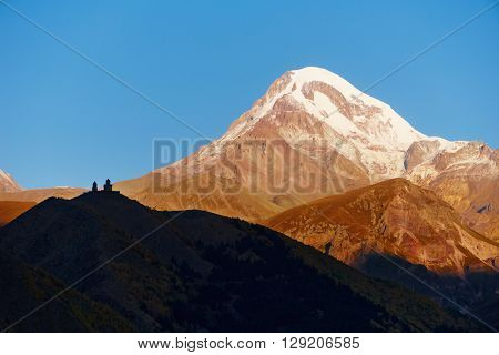 Kazbek Mount panorama with Gergeti Christian church