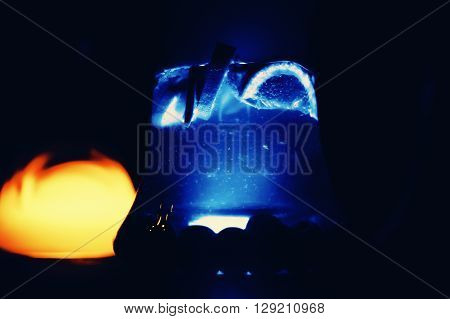 hookah shisha tube with floating fruits inside and natural lighting