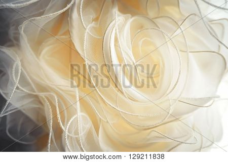 wedding dress detail close up. lace in roses form