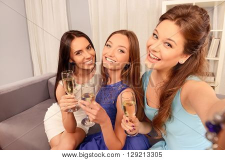 Three Pretty Women  Making Selfie With Glasses Of Shampagne