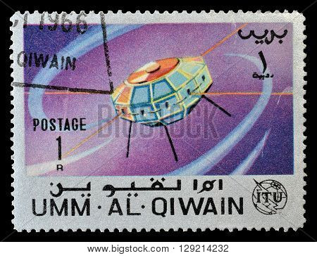 UMM AL QIWAIN - CIRCA 1966 : Cancelled postage stamp printed by Umm Al Qiwain, that shows Satellite.