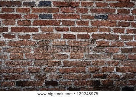 Old historical aged brick wall in color