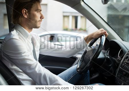 Man driving his car