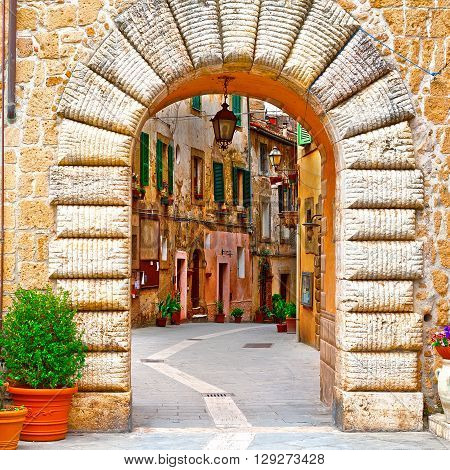 Arch of the Narrow Street with Old Buildings in the Medieval Italian City