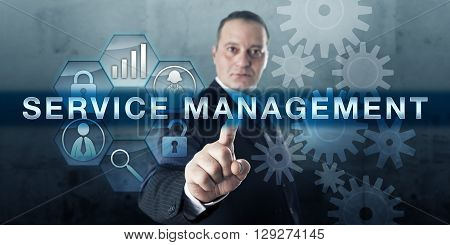 Entrepreneur pressing SERVICE MANAGEMENT on a virtual touch screen interface. Business concept for a service strategy focussed on fulfillment operations and optimization of customer service quality.