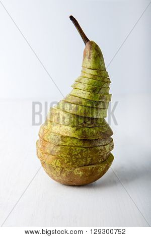 Sliced pear on white background