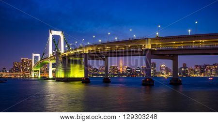 Panorama of Rainbow Bridge at night Tokyo Japan
