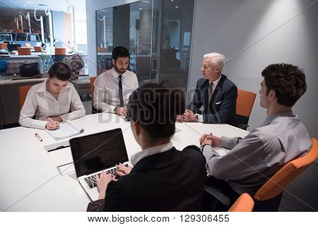 business people group brainstorming on meeting and businessman presenting ideas and projects oon laptop and tablet computer