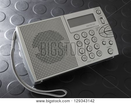 Portable radio that runs on batteries and tunes shortwave and broadcast bands