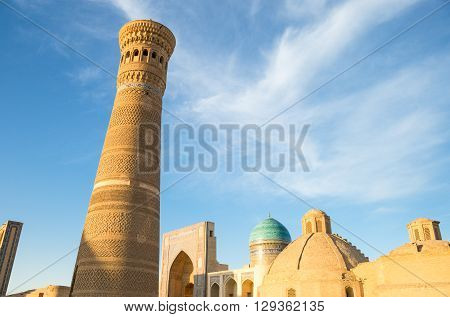 Uzbekistan Bukhara the Kalon minaret and the Mir-i-Arab madrassah in the background