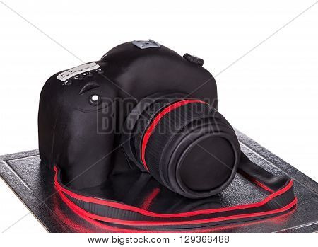 Cake camera to photograph birthday. On a white background.