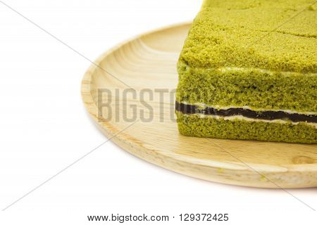 Closeup Japanese Matcha green tea cake cheesecake. space background