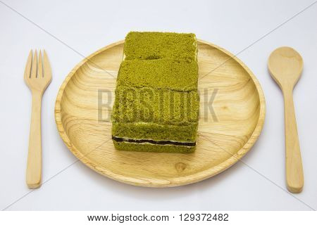 Japanese Matcha green tea cake cheesecake on white background