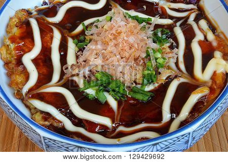Japanese Okonomiyaki is japanese pizza great and yammy