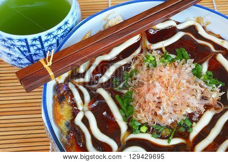 Japanese Okonomiyaki is japanese pizza great and yammy