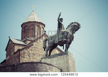 Tbilisi, Georgia - May 07: The Statue Of David The Builder In Front Of The Virgin Mary Metekhi Churc