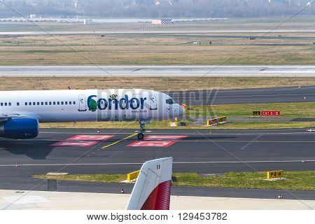 DUSSELDORF NRW GERMANY - MARCH 18 2015: Condor Boing 757-300 during startup on the Duesseldorf airport.