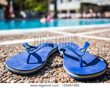 Salou Spain - June 14 2014: Havaianas flats in a swimming pool in Salou Spain