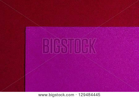 Eva foam ethylene vinyl acetate pink surface on red sponge plush background